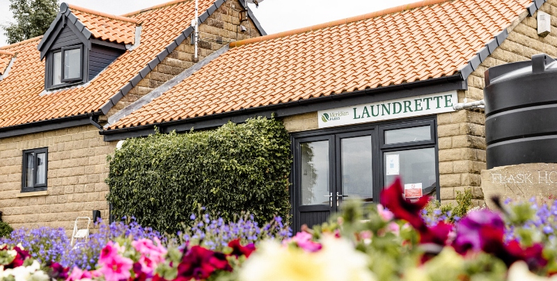 outside of the launderette at the flask holiday park