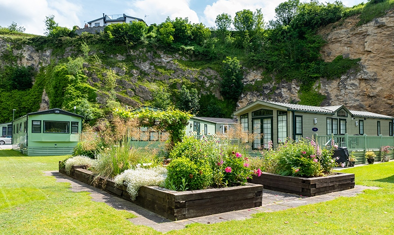 caravans surrounded by cliffs